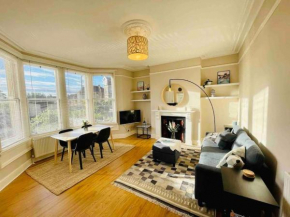 Bright, spacious apartment with off-road parking